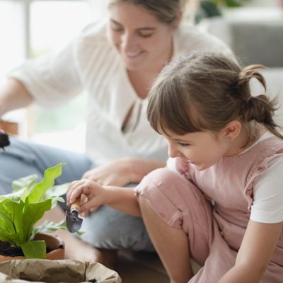 kid-potting-plant-at-home-as-hobby-min